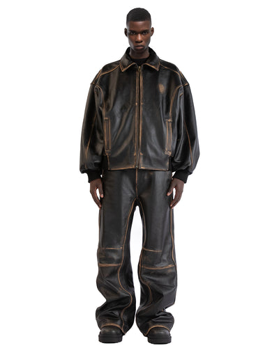 Untitled Artworks “Consumed” oversized leather bomber jacket in distressed calf leather with ribbed hem/cuffs and front zip closure. on model 