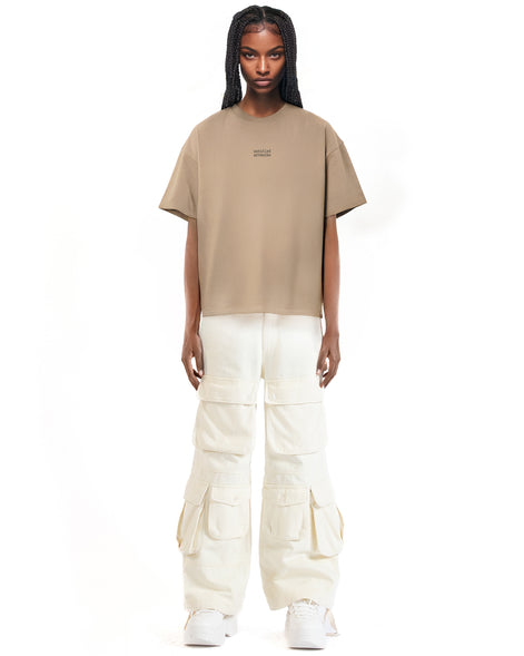 Front view of the taupe tee with large logo print