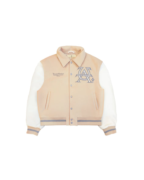 Untitled Artworks “Hunting Oat” varsity jacket in tan (oat) with embroidered hunting graphics and oversized letterman fit. Flat on model 