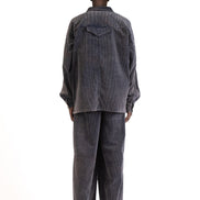 Back view highlighting dropped shoulders
