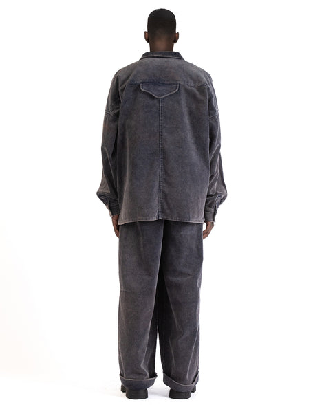 Back view highlighting dropped shoulders