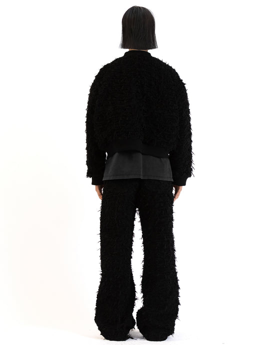 Side view showing ribbed collar and cuff details