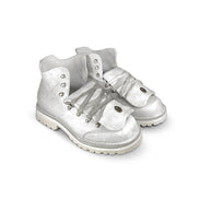 Close-up tongue view of the Untitled Artworks x Fracap Destroyer Boot in White, showcasing the distinctive spray-effect finish and premium leather construction.