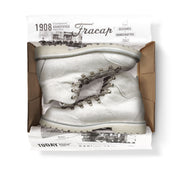 Close-up in box view of the Untitled Artworks x Fracap Destroyer Boot in White, showcasing the distinctive spray-effect finish and premium leather construction.