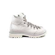 Close-up side view of the Untitled Artworks x Fracap Destroyer Boot in White, showcasing the distinctive spray-effect finish and premium leather construction.