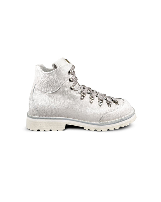 Close-up side view of the Untitled Artworks x Fracap Destroyer Boot in White, showcasing the distinctive spray-effect finish and premium leather construction.