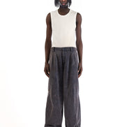 Front view of the blue corduroy pants showing the wide-leg cut and pleated front