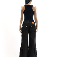Back angle of the cargo pants highlighting the relaxed silhouette and rear pockets