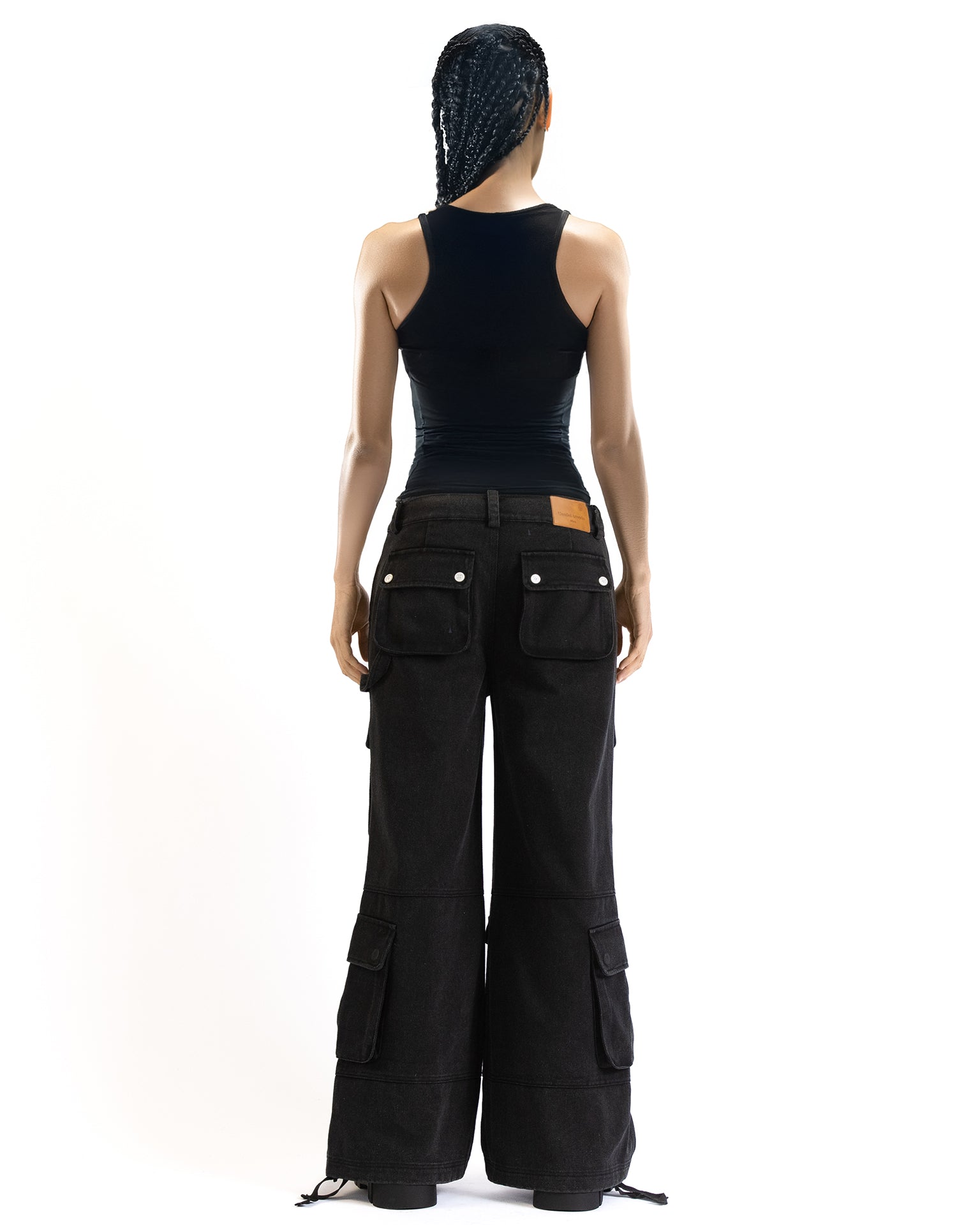 Back angle of the cargo pants highlighting the relaxed silhouette and rear pockets