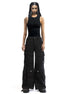 Front view of wide-leg washed black cargo pants showcasing the oversized fit and multiple pockets