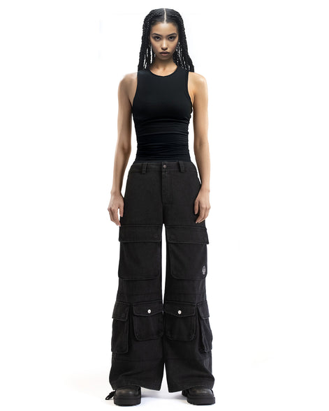 Front view of wide-leg washed black cargo pants showcasing the oversized fit and multiple pockets